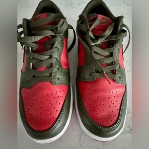 Nike Dunk Low Retro in the Mystic Red/Cargo Khaki.